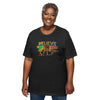 woman wearing a black tshirt with the words believe in yourself written on it with kente pattern